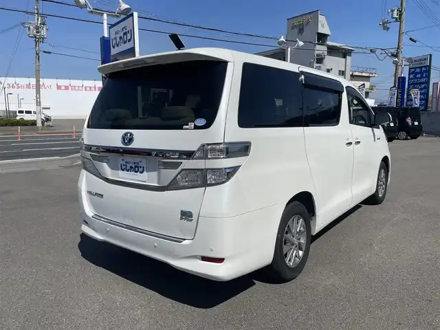トヨタ ヴェルファイア ハイブリット V 和歌山県 2012(平24)年 14.4万km ホワイトパールクリスタルシャイン (株)IDOMが運営する【じしゃロン和歌山店】の自社ローン専用車両になります。こちらは現金またはオートローンご利用時の価格です。自社ローンご希望の方は別途その旨お申付け下さい/純正HDDナビゲーション/バックカメラ/ETC/プッシュスタート/・スマートキー/ステアリングスイッチ/クルーズコントロ＾ル/コーナーセンサー/LEDライト/・オートライト/ウィンカーミラー/レザーシート/保証書/・取扱説明書/