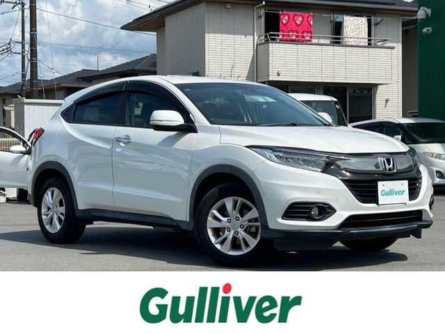 ホンダ ヴェゼル X ホンダセンシング 静岡県 2018(平30)年 6万km プラチナホワイトパール 純正メモリナビ（BT接続、CDチェンジャー、フルセグTV）/バックカメラ/クルーズコントロール（追従走行：有）/ドライブレコーダー/純正フロアマット/純正アルミホイール/D＋N席シートヒーター/スマートキー（スペアキー：1本）/ETC/USB入力端子/ABS/横滑り防止装置/コーナーセンサー/レーンキープアシスト/オートライト/LEDヘッドライト/W＋サイドエアバッグ/カーテンエアバッグ/衝突軽減システム