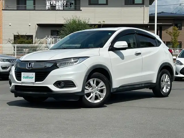 ホンダ ヴェゼル X ホンダセンシング 静岡県 2018(平30)年 6万km プラチナホワイトパール 純正メモリナビ（BT接続、CDチェンジャー、フルセグTV）/バックカメラ/クルーズコントロール（追従走行：有）/ドライブレコーダー/純正フロアマット/純正アルミホイール/D＋N席シートヒーター/スマートキー（スペアキー：1本）/ETC/USB入力端子/ABS/横滑り防止装置/コーナーセンサー/レーンキープアシスト/オートライト/LEDヘッドライト/W＋サイドエアバッグ/カーテンエアバッグ/衝突軽減システム