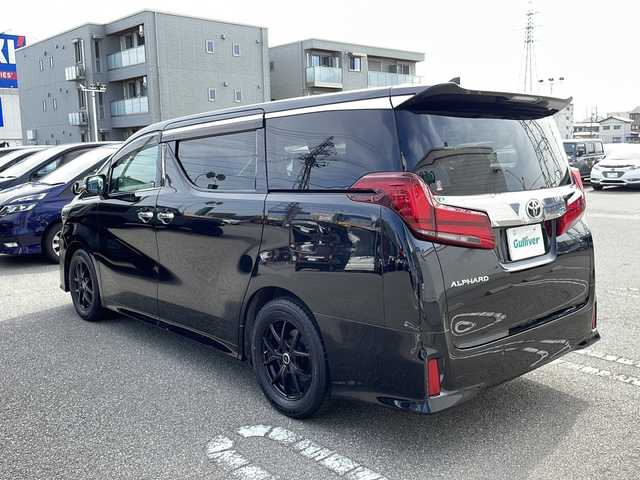 トヨタ アルファード S Cパッケージ 石川県 2020(令2)年 5.7万km ブラック メーカーディスプレイオーディオ/　（フルセグ・BT・USB・HDMI・AppleCarPlay）/純正フリップダウンモニター/バックカメラ/両側パワースライドドア/パワーシート（D席メモリーシート）/前席シートヒーター/前席ベンチレーションシート/オットマン/パワーバックドア/１００V電源/ウッドコンビステアリング/ステアリングスイッチ/ステアリングヒーター/レーダークルーズコントロール/後席サンシェード/ＬＥＤヘッドライト/ＬＥＤフォグランプ/オートライト・オートハイビーム/純正AW付サマータイヤ（235/50R18:2024年製６ｍｍ）