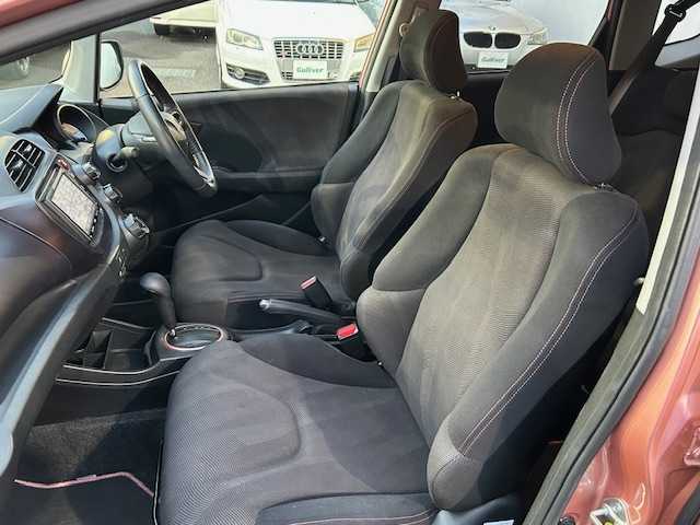 ホンダ フィット シーズ 東京都 2010(平22)年 7.7万km ピンクゴールドメタリック 純正ナビHDDナビ/フルセグ/DVD再生機能有/CD・SD・AM・FM/スタッドレスタイヤホイール4本セット/ETC/ドアバイザー/純正フロアマット/取扱説明書/記録簿