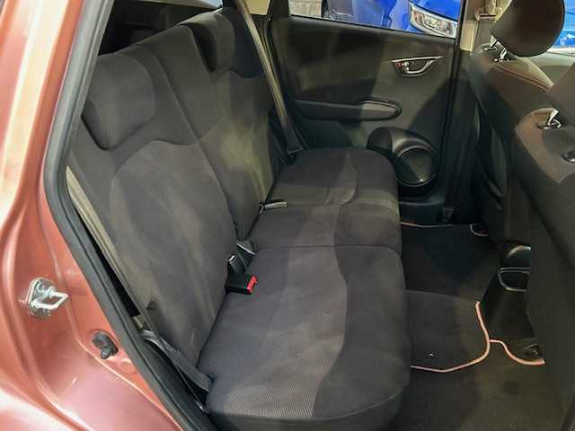 ホンダ フィット シーズ 東京都 2010(平22)年 7.7万km ピンクゴールドメタリック 純正ナビHDDナビ/フルセグ/DVD再生機能有/CD・SD・AM・FM/スタッドレスタイヤホイール4本セット/ETC/ドアバイザー/純正フロアマット/取扱説明書/記録簿