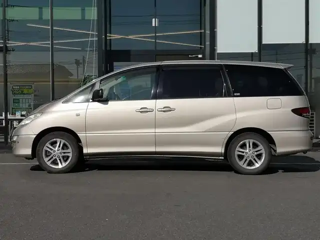 トヨタ エスティマ Ｔ G 茨城県 2003(平15)年 18万km ベージュM 純正ナビ/【CD・DVD・MD・AM・FM・TV】/クルコン/ETC/Bカメラ/フロントカメラ/両側スライドドア/前方コーナーセンサー/オートライト/Fフォグ/キセノンライト/ヘッドライトレベライザー/純正フロアマット/純正アルミホイール