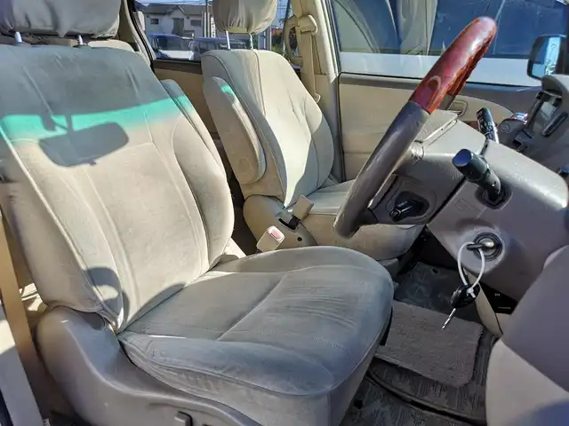 トヨタ エスティマ Ｔ G 茨城県 2003(平15)年 18万km ベージュM 純正ナビ/【CD・DVD・MD・AM・FM・TV】/クルコン/ETC/Bカメラ/フロントカメラ/両側スライドドア/前方コーナーセンサー/オートライト/Fフォグ/キセノンライト/ヘッドライトレベライザー/純正フロアマット/純正アルミホイール