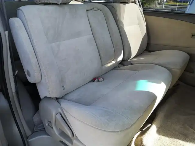 トヨタ エスティマ Ｔ G 茨城県 2003(平15)年 18万km ベージュM 純正ナビ/【CD・DVD・MD・AM・FM・TV】/クルコン/ETC/Bカメラ/フロントカメラ/両側スライドドア/前方コーナーセンサー/オートライト/Fフォグ/キセノンライト/ヘッドライトレベライザー/純正フロアマット/純正アルミホイール