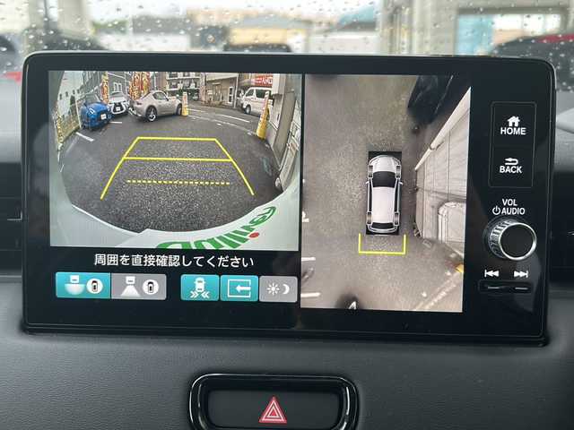 ホンダ ヴェゼル ハイブリッド e:HEV Z 神奈川県 2025(令7)年 0.4万km プラチナホワイトパール 登録時走行距離3752km/ワンオーナー/純正ナビ/【AppleCarPlay/AndroidAuto/BT/USB/TV】/全方位カメラ/置くだけ充電/レーダークルーズコントロール/前後コーナーセンサー/衝突軽減ブレーキ/先行車発信お知らせ/車線逸脱警報/レーンキープアシスト/ブラインドスポットモニター/ロードサインアシスト/電動リアゲート/電動パーキングブレーキ/オートブレーキホールド/ダウンヒルアシストコントロール/前後ドライブレコーダー/ビルトインETC2.0/ステアリングヒーター/前席シートヒーター/オートマチックハイビーム/LEDオートライト/ハーフレザーシート/横滑り防止装置/盗難防止装置/スペアキー×１/ISOFIX/新車時保証書/取扱説明書
