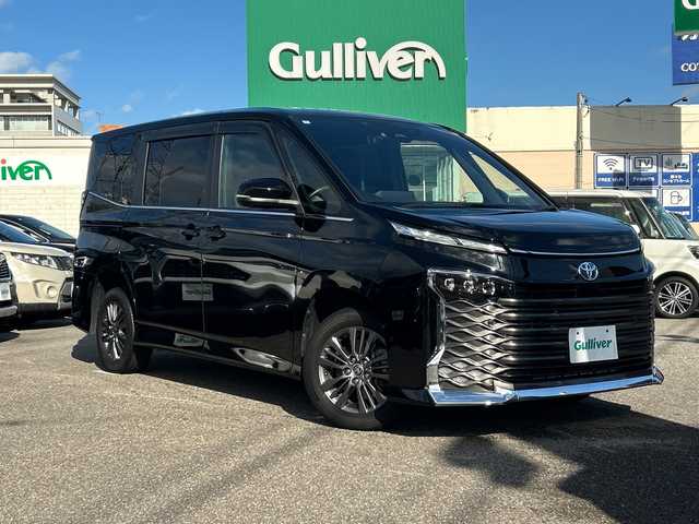 トヨタ ヴォクシー ハイブリッド S－Z 石川県 2022(令4)年 2.2万km アティチュードブラックマイカ SDナビ/Bluetooth/全方位カメラ/フルセグTV/ETC/ドライブレコーダー/シートヒーター/両側パワースライドドア/LEDヘッドライト/レーダークルーズコントロール/スマートキー/デジタルインナーミラー