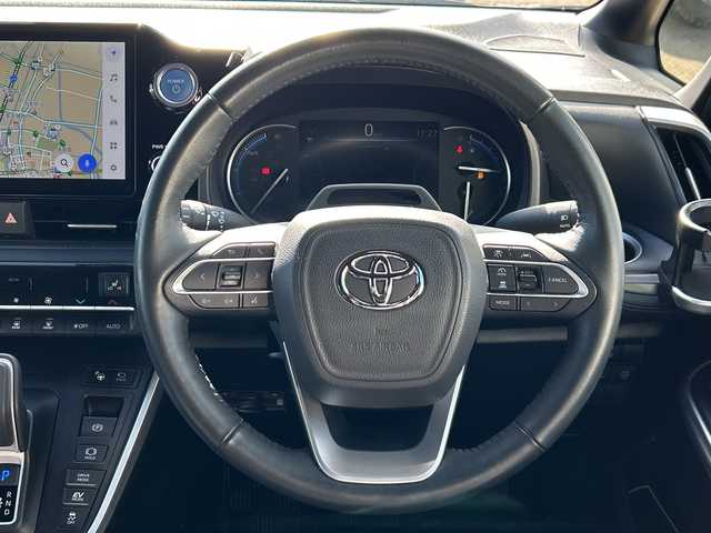 トヨタ ヴォクシー ハイブリッド S－Z 石川県 2022(令4)年 2.2万km アティチュードブラックマイカ SDナビ/Bluetooth/全方位カメラ/フルセグTV/ETC/ドライブレコーダー/シートヒーター/両側パワースライドドア/LEDヘッドライト/レーダークルーズコントロール/スマートキー/デジタルインナーミラー