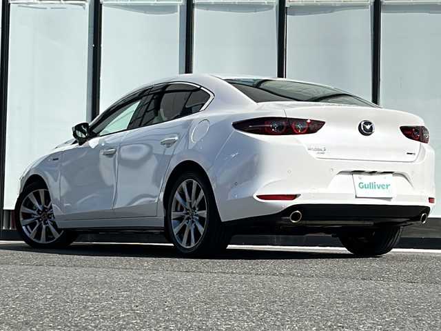 マツダ マツダ３セダン 20S 100周年特別記念車 山形県 2021(令3)年 0.9万km スノーフレイクホワイトパールマイカ ワンオーナー/4WD/BSM/レーダークルーズコントロール/レーンキープアシスト/BOSEサウンドシステム/前後コーナーセンサー/純正ナビ/（Bluetooth/CD/DVD/フルセグ)/全方位カメラ/LEDオートライト/オートマチックハイビーム/レザーシート/DN席シートヒーター/D席パワーシート/シートメモリ/前後純正ドライブレコーダー/ステアリングスイッチ/ステアリングヒーター/電動パーキングブレーキ/オートブレーキホールド/ETC/純正AW/純正フロアマット/電動格納ウィンカーミラー/スマートキー×2　/エンジンスターター/ドアバイザー