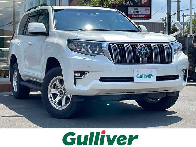 トヨタ ランドクルーザー プラド TX 道央・札幌 2018(平30)年 4万km ホワイトパールクリスタルシャイン ・４WD/・衝突軽減ブレーキ/・寒冷地仕様/・サンルーフ/・純正SDナビ/　CD＆DVD＆BT＆TV/・バックカメラ/・ディーゼルターボ/・レーンキープアシスト/・レーダークルーズコントロール/・コーナーセンサー/・ダウンヒルアシスト/・ビルトインETC/・MT付きAT/・ワイパー熱線/・オートエアコン/・オートライト/・オートハイビーム/・プッシュスタート/・スマートキー/・純正AW＆夏タイヤ積込/　265/65/17 2018年製/・社外フロアマット/・LEDヘッドライト/・ウィンカーミラー/・ルーフレール/・フォグライト