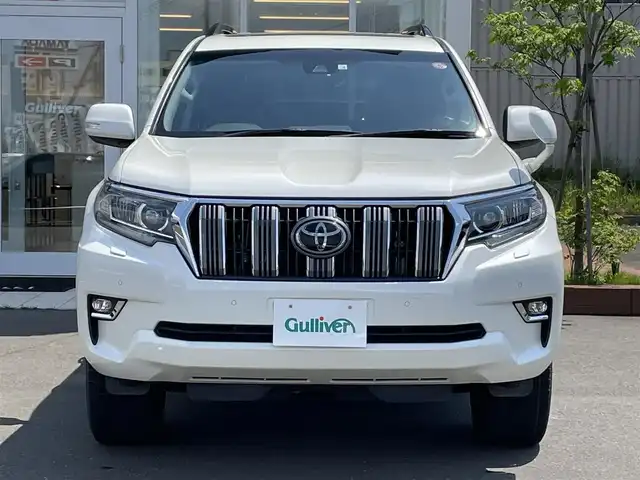 トヨタ ランドクルーザー プラド TX 道央・札幌 2018(平30)年 4万km ホワイトパールクリスタルシャイン ・４WD/・衝突軽減ブレーキ/・寒冷地仕様/・サンルーフ/・純正SDナビ/　CD＆DVD＆BT＆TV/・バックカメラ/・ディーゼルターボ/・レーンキープアシスト/・レーダークルーズコントロール/・コーナーセンサー/・ダウンヒルアシスト/・ビルトインETC/・MT付きAT/・ワイパー熱線/・オートエアコン/・オートライト/・オートハイビーム/・プッシュスタート/・スマートキー/・純正AW＆夏タイヤ積込/　265/65/17 2018年製/・社外フロアマット/・LEDヘッドライト/・ウィンカーミラー/・ルーフレール/・フォグライト