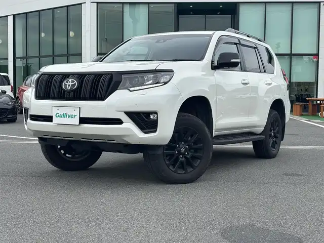 トヨタ ランドクルーザー プラド TX Lパッケージ マットブラED 奈良県 2023(令5)年 3万km ホワイトパールクリスタルシャイン 純正９インチメモリナビ　/フルセグ/サンルーフ　/レザーシート　/ブラインドスポットモニター　/全方位カメラ　/シートヒーター　/エアシート　/パワーシート　/Ｂｌｕｅｔｏｏｔｈ　/追従クルーズコントロール　/電動格納サードシート/パーキングサポートブレーキ/ETC2.0/ヘッドライトウォッシャー/センサーデフロック