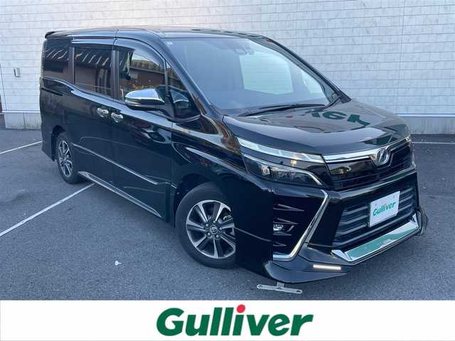 トヨタ ヴォクシー ZS 煌 兵庫県 2018(平30)年 6.5万km イナズマスパーキングブラックガラスフレーク ワンオーナー　/純正ナビ　/・フルセグＴＶ　/・Ｂｌｕｅｔｏｏｔｈ接続　/・ＤＶＤ再生　/TRDエアロ（フロント、サイド、リア）/両側パワースライドドア　/クルーズコントロール　/プリクラッシュセーフティー　/バックカメラ　/プッシュスタート　/スマートキー　/ビルトインETC/ドライブレコーダー/スペアキー　/ＬＥＤオートライト/オートハイビーム/純正16インチアルミホイール/純正フロアマット/取扱説明書/保証書