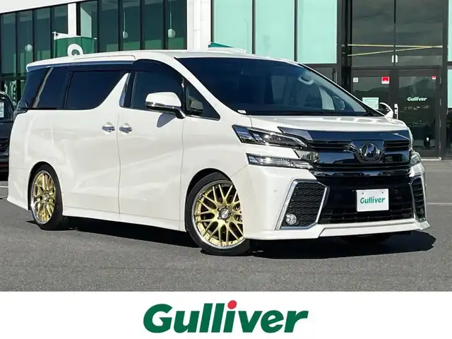 トヨタ ヴェルファイア Z Aエディション 奈良県 2016(平28)年 6.1万km ホワイトパールクリスタルシャイン ALPINE10インチナビ（EX10）/（フルセグ/BT/CD/DVD)/ALPINE12.8インチフリップダウンモニター（PXH12-RB-AV/クルーズコントロール/バックカメラ/前後コーナーセンサー/両側パワースライドドア/社外足回り（車高調）/レザー調シートカバー/LEDヘッドライト/オートライト/ETC/WORK20インチAW/保証書/スペアキーX1