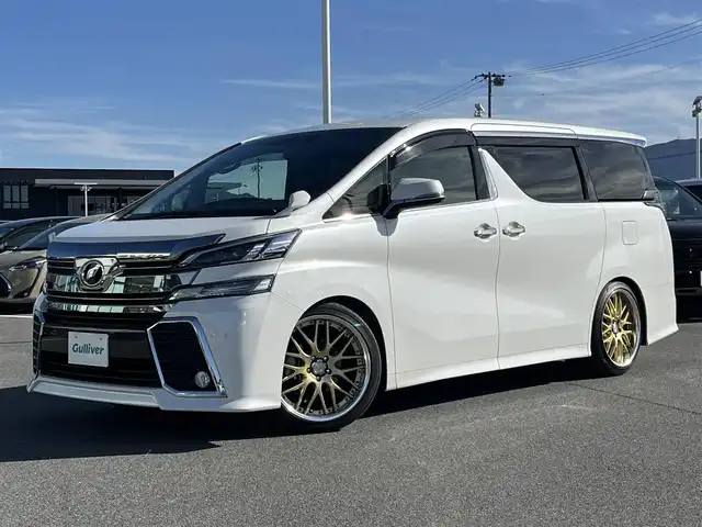 トヨタ ヴェルファイア Z Aエディション 奈良県 2016(平28)年 6.1万km ホワイトパールクリスタルシャイン ALPINE10インチナビ（EX10）/（フルセグ/BT/CD/DVD)/ALPINE12.8インチフリップダウンモニター（PXH12-RB-AV/クルーズコントロール/バックカメラ/前後コーナーセンサー/両側パワースライドドア/社外足回り（車高調）/レザー調シートカバー/LEDヘッドライト/オートライト/ETC/WORK20インチAW/保証書/スペアキーX1