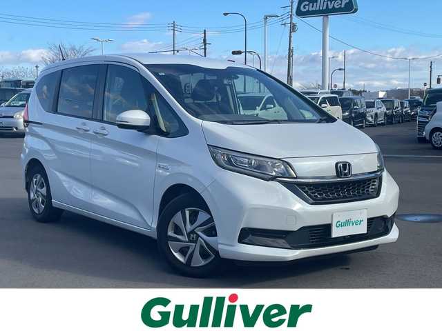 ホンダ フリード ハイブリット G ホンダセンシング 千葉県 2019(令1)年 6.9万km プラチナホワイトパール 禁煙車/純正ナビ/・VXM-204VFi/・CD/DVD/BT/フルセグ/両側パワースライドドア/バックカメラ/衝突被害軽減ブレーキ/車線逸脱警報/レーダークルーズコントロール/前席シートヒーター/LEDヘッドライト/オートライト/ビルトインETC/スマートキー/スペアキー