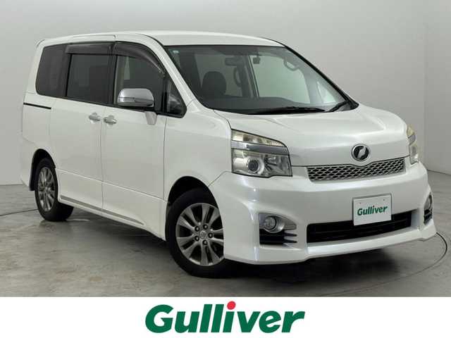 トヨタ ヴォクシー ZS 煌Ⅲ 福岡県 2012(平24)年 13.2万km ホワイトパールクリスタルシャイン 純正ナビ（Ｂｌｕｅｔｏｏｔｈ，フルセグＴＶ）　/バックカメラ　/ＥＴＣ　/前方ドライブレコーダー　/両側電動スライドドア　/ＭＴモード付き　/ハーフレザーシート　/プッシュスタート　/純正１６インチアルミホイール