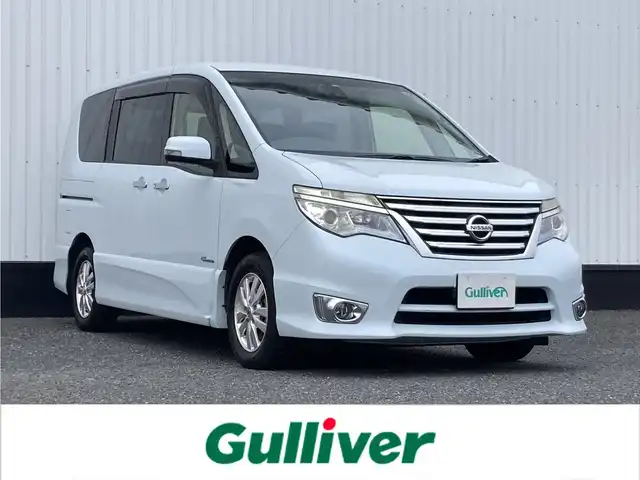 日産 セレナ ハイウェイスター Sハイブリッド 千葉県 2014(平26)年 6.9万km ブルームーンホワイトP 純正メモリナビ/(TV/BT/CD/DVD/FM/AM)/バックカメラ/衝突被害軽減システム/車線逸脱警報/クルーズコントロール/純正フリップダウンモニター/両側スライドドア/横滑り防止装置/ETC/前後ドライブレコーダー/LEDヘッドライト/フォグランプ/オートライト/ウィンカーミラー/電動格納ミラー/純正15インチAW/シートリフター/プッシュスタート/スマートキー/フロアマット/ドアバイザー/取扱説明書/保証書