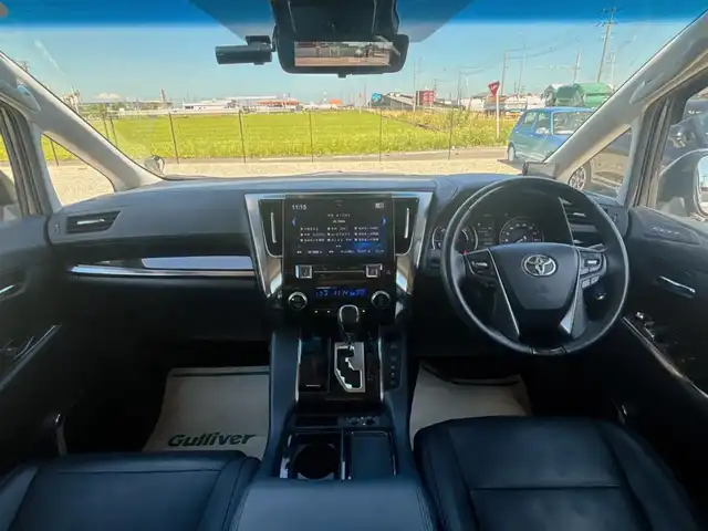 トヨタ アルファードハイブリット SR Cパッケージ 富山県 2019(平31)年 7.7万km グラファイトM 4WD/ツインムーンルーフ/アルパインナビ/フルセグTV/両側パワースライドドア/パワーバックドア/バックモニター/ビルトインETC/ドライブレコーダー/アルパイン12.8型リアビジョン/レーダークルーズコントロール/インテリジェントクリアランスソナー/セーフティセンス/・プリクラッシュセーフティ/・レーントレーシングアシスト/・ロードサインアシスト/・アダプティブハイビームシステム/純正OP3眼LEDヘッドランプ/デュアルオートエアコン/木目調/革巻きコンビステアリング/本革シート/前席パワーシート/快適温熱シート/助手席パワーオットマン/2列目エグゼクティブパワーシート/純正17インチアルミホイール/スマートエントリー/プッシュスタートシステム/ウェルカムパワースライドドア機能付/禁煙車