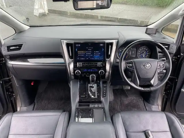 トヨタ アルファードハイブリット SR Cパッケージ 富山県 2019(平31)年 7.7万km グラファイトM 4WD/ツインムーンルーフ/アルパインナビ/フルセグTV/両側パワースライドドア/パワーバックドア/バックモニター/ビルトインETC/ドライブレコーダー/アルパイン12.8型リアビジョン/レーダークルーズコントロール/インテリジェントクリアランスソナー/セーフティセンス/・プリクラッシュセーフティ/・レーントレーシングアシスト/・ロードサインアシスト/・アダプティブハイビームシステム/純正OP3眼LEDヘッドランプ/デュアルオートエアコン/木目調/革巻きコンビステアリング/本革シート/前席パワーシート/快適温熱シート/助手席パワーオットマン/2列目エグゼクティブパワーシート/純正17インチアルミホイール/スマートエントリー/プッシュスタートシステム/ウェルカムパワースライドドア機能付/禁煙車