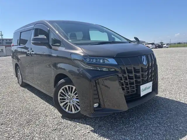 トヨタ アルファードハイブリット SR Cパッケージ 富山県 2019(平31)年 7.7万km グラファイトM 4WD/ツインムーンルーフ/アルパインナビ/フルセグTV/両側パワースライドドア/パワーバックドア/バックモニター/ビルトインETC/ドライブレコーダー/アルパイン12.8型リアビジョン/レーダークルーズコントロール/インテリジェントクリアランスソナー/セーフティセンス/・プリクラッシュセーフティ/・レーントレーシングアシスト/・ロードサインアシスト/・アダプティブハイビームシステム/純正OP3眼LEDヘッドランプ/デュアルオートエアコン/木目調/革巻きコンビステアリング/本革シート/前席パワーシート/快適温熱シート/助手席パワーオットマン/2列目エグゼクティブパワーシート/純正17インチアルミホイール/スマートエントリー/プッシュスタートシステム/ウェルカムパワースライドドア機能付/禁煙車