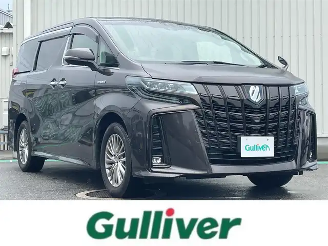 トヨタ アルファードハイブリット SR Cパッケージ 富山県 2019(平31)年 7.7万km グラファイトM 4WD/ツインムーンルーフ/アルパインナビ/フルセグTV/両側パワースライドドア/パワーバックドア/バックモニター/ビルトインETC/ドライブレコーダー/アルパイン12.8型リアビジョン/レーダークルーズコントロール/インテリジェントクリアランスソナー/セーフティセンス/・プリクラッシュセーフティ/・レーントレーシングアシスト/・ロードサインアシスト/・アダプティブハイビームシステム/純正OP3眼LEDヘッドランプ/デュアルオートエアコン/木目調/革巻きコンビステアリング/本革シート/前席パワーシート/快適温熱シート/助手席パワーオットマン/2列目エグゼクティブパワーシート/純正17インチアルミホイール/スマートエントリー/プッシュスタートシステム/ウェルカムパワースライドドア機能付/禁煙車