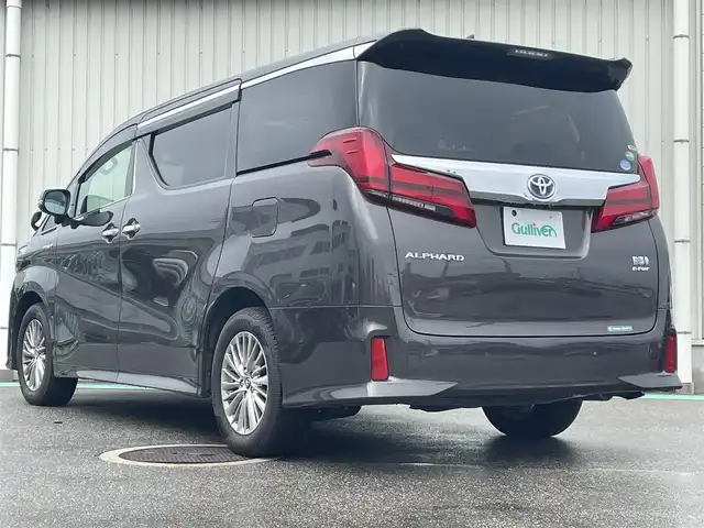 トヨタ アルファードハイブリット SR Cパッケージ 富山県 2019(平31)年 7.7万km グラファイトM 4WD/ツインムーンルーフ/アルパインナビ/フルセグTV/両側パワースライドドア/パワーバックドア/バックモニター/ビルトインETC/ドライブレコーダー/アルパイン12.8型リアビジョン/レーダークルーズコントロール/インテリジェントクリアランスソナー/セーフティセンス/・プリクラッシュセーフティ/・レーントレーシングアシスト/・ロードサインアシスト/・アダプティブハイビームシステム/純正OP3眼LEDヘッドランプ/デュアルオートエアコン/木目調/革巻きコンビステアリング/本革シート/前席パワーシート/快適温熱シート/助手席パワーオットマン/2列目エグゼクティブパワーシート/純正17インチアルミホイール/スマートエントリー/プッシュスタートシステム/ウェルカムパワースライドドア機能付/禁煙車