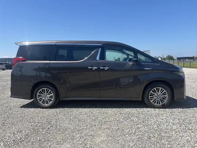 トヨタ アルファードハイブリット SR Cパッケージ 富山県 2019(平31)年 7.7万km グラファイトM 4WD/ツインムーンルーフ/アルパインナビ/フルセグTV/両側パワースライドドア/パワーバックドア/バックモニター/ビルトインETC/ドライブレコーダー/アルパイン12.8型リアビジョン/レーダークルーズコントロール/インテリジェントクリアランスソナー/セーフティセンス/・プリクラッシュセーフティ/・レーントレーシングアシスト/・ロードサインアシスト/・アダプティブハイビームシステム/純正OP3眼LEDヘッドランプ/デュアルオートエアコン/木目調/革巻きコンビステアリング/本革シート/前席パワーシート/快適温熱シート/助手席パワーオットマン/2列目エグゼクティブパワーシート/純正17インチアルミホイール/スマートエントリー/プッシュスタートシステム/ウェルカムパワースライドドア機能付/禁煙車