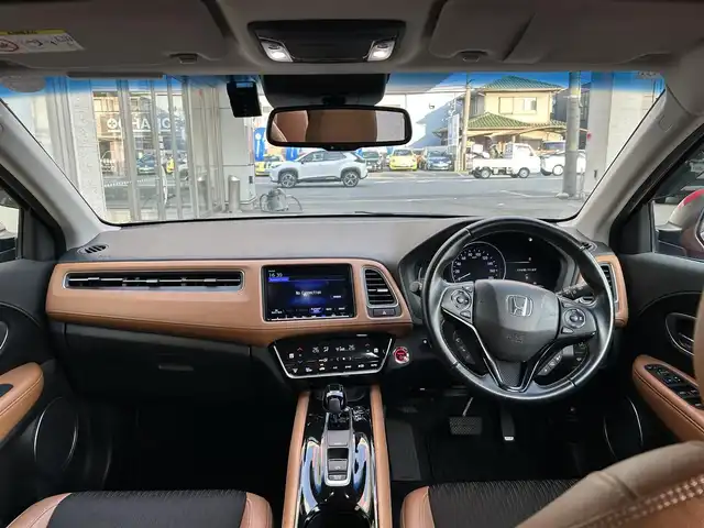ホンダ ヴェゼル ハイブリッド Z ホンダセンシング 大阪府 2018(平30)年 10万km プレミアムクリスタルレッドM １オーナー/純正ナビ/（フルセグ／ＢＴ／ＣＤ／ＤＶＤ）/バックカメラ/クルーズコントロール/衝突被害軽減システム/レーンキープアシスト/横滑り機能/ハーフレザーシート/前席シートヒーター/純正ＡＷ/純正フロアマット/ドラレコ/ＥＴＣ