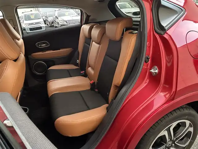 ホンダ ヴェゼル ハイブリッド Z ホンダセンシング 大阪府 2018(平30)年 10万km プレミアムクリスタルレッドM １オーナー/純正ナビ/（フルセグ／ＢＴ／ＣＤ／ＤＶＤ）/バックカメラ/クルーズコントロール/衝突被害軽減システム/レーンキープアシスト/横滑り機能/ハーフレザーシート/前席シートヒーター/純正ＡＷ/純正フロアマット/ドラレコ/ＥＴＣ