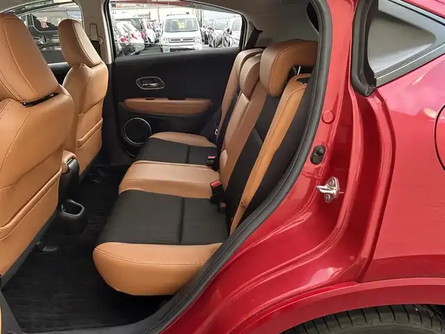 ホンダ ヴェゼル ハイブリッド Z ホンダセンシング 大阪府 2018(平30)年 10万km プレミアムクリスタルレッドM １オーナー/純正ナビ/（フルセグ／ＢＴ／ＣＤ／ＤＶＤ）/バックカメラ/クルーズコントロール/衝突被害軽減システム/レーンキープアシスト/横滑り機能/ハーフレザーシート/前席シートヒーター/純正ＡＷ/純正フロアマット/ドラレコ/ＥＴＣ