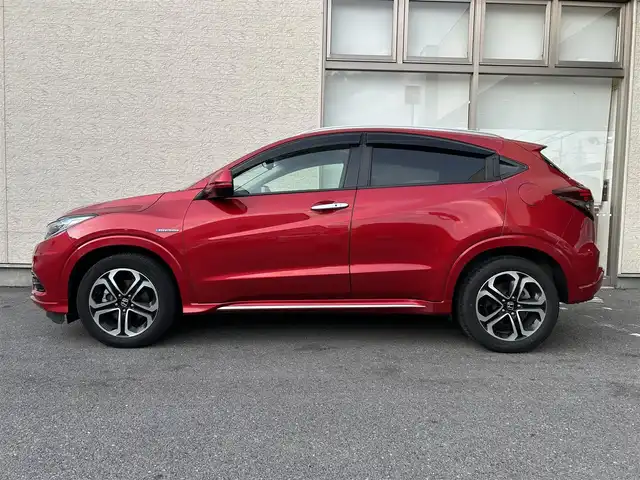 ホンダ ヴェゼル ハイブリッド Z ホンダセンシング 大阪府 2018(平30)年 10万km プレミアムクリスタルレッドM １オーナー/純正ナビ/（フルセグ／ＢＴ／ＣＤ／ＤＶＤ）/バックカメラ/クルーズコントロール/衝突被害軽減システム/レーンキープアシスト/横滑り機能/ハーフレザーシート/前席シートヒーター/純正ＡＷ/純正フロアマット/ドラレコ/ＥＴＣ