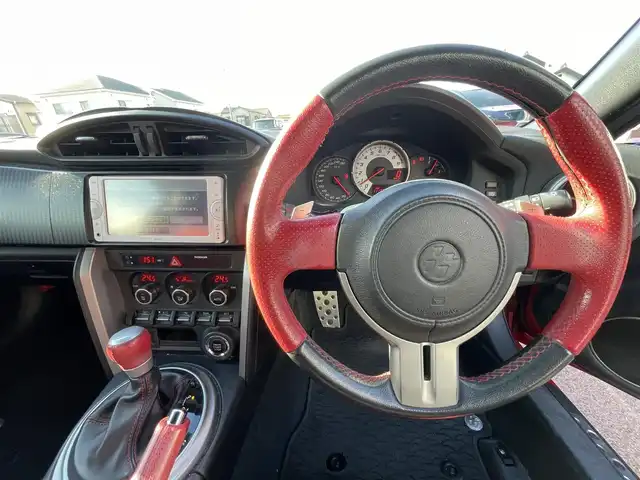 トヨタ ８６ GT リミテッド 愛知県 2013(平25)年 11.2万km ライトニングレッド 純正ＳＤナビ　/Ｂカメラ　/ＴＶ　/ＢＴ　/プッシュスタート　/ＥＴＣ　/前席シートヒーター　/パドルシフト　/革ハンドル　/純正フロアマット　/ドアバイザー　/スペアキー　/純正１７インチＡＷ
