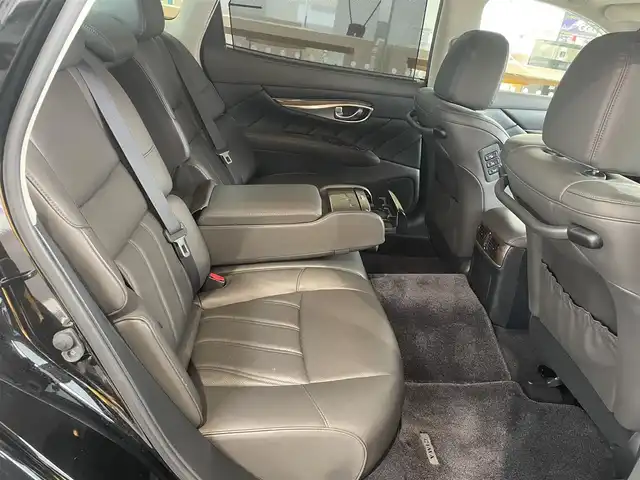 日産 シーマ ハイブリッド VIP 愛知県 2014(平26)年 11.9万km スーパーブラック サンルーフ/レザーシート/前席シートヒーター/前席シートベンチレーション/前席シパワーシート/運転席メモリシート/助手席オットマン/メーカーナビ/・地デジテTV/DVD/バックカメラ/ETC/レーダークルーズコントロール/左右独立エアコン/純正18インチAW/社外AWスタッドレスタイヤ積み込み（245/50/R18）/スペアタイヤ/HIDヘッドランプ/電動リヤサンシェード/スマートキー＆プッシュスタート/電動チルトステアリング