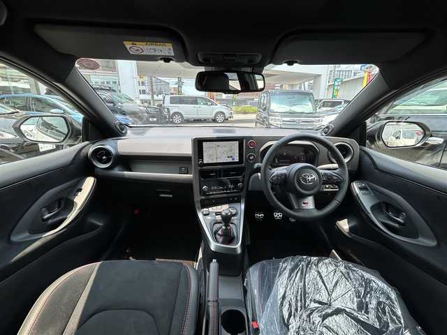 トヨタ ＧＲヤリス RZ ハイパフォーマンス 福岡県 2025(令7)年 0.1万km未満 プラチナホワイトパールマイカ ワンオーナー/純正メモリーナビ/純正USB/BT/Miracast/JBLサウンド/バックモニター/レーダークルーズコントロール/純正18インチAW/LEDヘッドライト/ハーフレザーシート/前席シートヒーター/ステアリングヒーター/ビルトインETC/トヨタセーフティセンス/コーナーセンサー/オートハイビーム/オート電格ミラー/プッシュスタート/スペアキー/保証書/取扱説明書