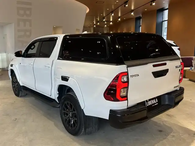 トヨタ ハイラックス Z GRスポーツ 富山県 2022(令4)年 2.8万km スーパーホワイトⅡ AERO KLAS製キャノピー/Bi-BeamLEDヘッドランプ/パノラミックビューモニター/レーダークルーズコントロール/ブリクラッシュセーフティ/レーンディパーチャーアラート/専用18インチAW/スタッドレスタイヤAWセット/ハーフレザーシート/クリアランスソナー