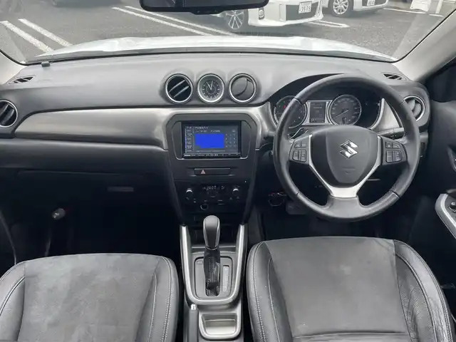スズキ エスクード 愛知県 2016(平28)年 8.2万km クールホワイトパール 社外SDナビ(FM/AM/CD/DVD/BT/HDMI/iPod/USB/ワンセグ)/衝突軽減ブレーキ/全車速追従機能付クルーズコントロール/バックカメラ/ハーフレザーシート/HIDヘッドライト/フォグランプ/電動格納ミラー/純正AW17インチ/防眩ミラー/アイドリングストップ/ETC/プッシュスタート/スマートキー/ステアリングリモコン/ハンズフリー/ABS/取扱説明書・保証書