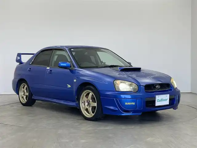 スバル インプレッサ ＷＲＸ 2004 V－Limited 埼玉県 2005(平17)年 7.3万km WRブルーマイカ ＥＴＣ　ＣＤ再生　純正アルミホイール　ＨＩＤライト　リモコンキー　パワーステアリング　パワーウインドウ　オートエアコン