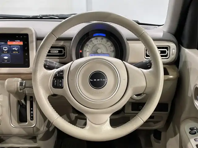 スズキ ラパン X 愛知県 2017(平29)年 4.1万km フォーンベージュメタリック/ホワイト2トーンルーフ 純正ナビ　/（ディスク/ラジオ/フルセグTV/USB/iPod/Bluetooth/aha/AUX)/アラウンドビューモニター　/衝突軽減ブレーキ　/シートヒーター　/ビルトインＥＴＣ　/アイドリングストップ　/ＵＳＢ接続　/アクセサリーソケット/ＬＥＤヘッドランプ　/ステアリングスイッチ　/プッシュスタート　/　　-スマートキー/横滑り防止/純正フロアマット/ISOFIX/電格ミラー