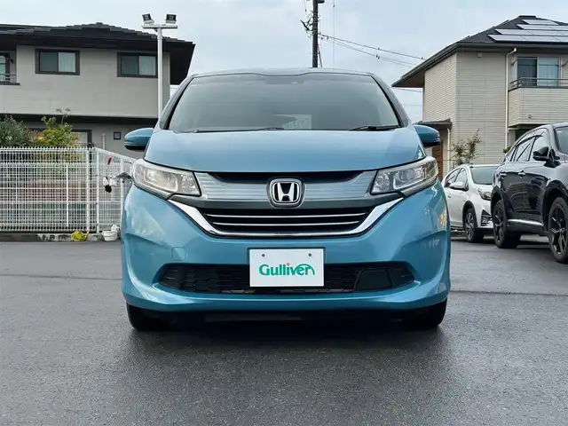 ホンダ フリード＋ ハイブリット G ホンダセンシング 静岡県 2017(平29)年 2.5万km 青 エンジンスタートボタン/パワーステアリング/パワーウィンドウ/アイドリングストップ/オートエアコン/クルーズコントロール追従走行/Bluetooth/ETC/バックカメラ/SDナビ/TV（フルセグ、地デジ視聴可）/ハーフレザーシート/両側パワースライドドア/純正アルミホイール/ABS/横滑り防止装置/レーンキープアシスト/オートライト/Wエアバッグ/衝突軽減システム
