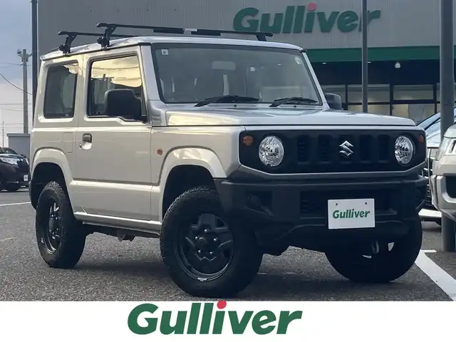 スズキ ジムニー XG 島根県 2021(令3)年 3.4万km シルキーシルバーメタリック ワンオーナー /社外オーディオプレイヤー(ラジオ/CD/USB/BT)/5MT/切り替え4WD/ハロゲンライト/LEDルームランプ/純正ゴムマット/取扱説明書/保証書