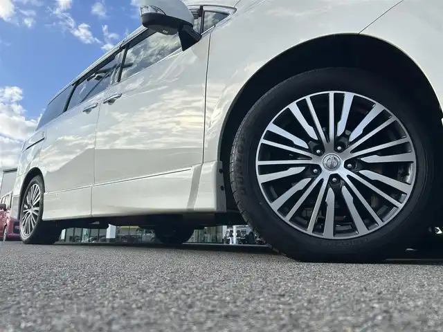 日産 エルグランド 250ハイウェイスターS 愛媛県 2018(平30)年 5.2万km ブリリアントホワイトパール ディーラーオプション純正ナビ/BT/AM・FM/CD/DVD/フルセグ/AUX/ETC/ドライブレコーダー/クルーズコントロール/三列シート/純正フロアマット/純正アルミホイール/Clazzio製レザー調シートカバー/純正エアロパーツ/LEDヘッドライト/フォグランプ