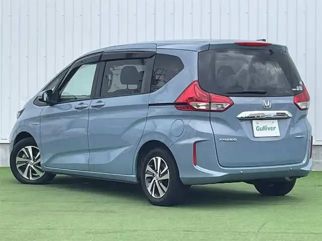 ホンダ フリード ハイブリット G ホンダセンシング 香川県 2020(令2)年 6.8万km シーグラスブルーパール ホンダセンシング/Sパッケージ/Cパッケージ/純正ナビ/バックカメラ/両側パワースライドドア/ハーフレザーシート/シートヒーター/革巻きステアリング/ステアリングリモコン/レーダークルーズ/LEDライト/リアロールサンシェード/スマートキー/プッシュスタート