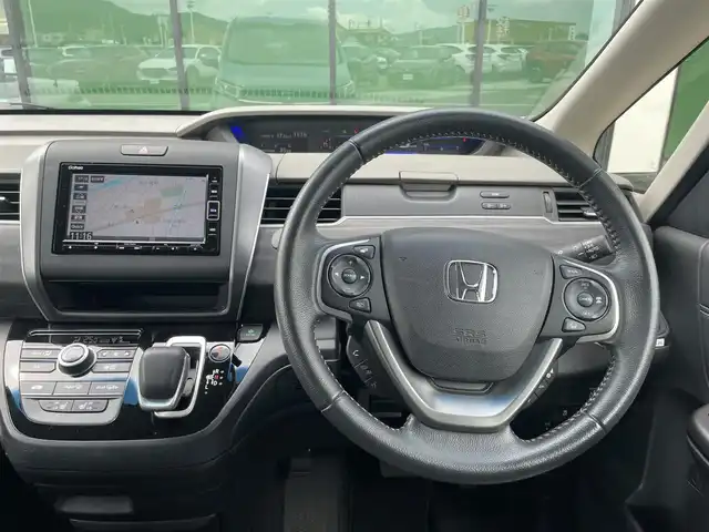 ホンダ フリード ハイブリット G ホンダセンシング 香川県 2020(令2)年 6.8万km シーグラスブルーパール ホンダセンシング/Sパッケージ/Cパッケージ/純正ナビ/バックカメラ/両側パワースライドドア/ハーフレザーシート/シートヒーター/革巻きステアリング/ステアリングリモコン/レーダークルーズ/LEDライト/リアロールサンシェード/スマートキー/プッシュスタート