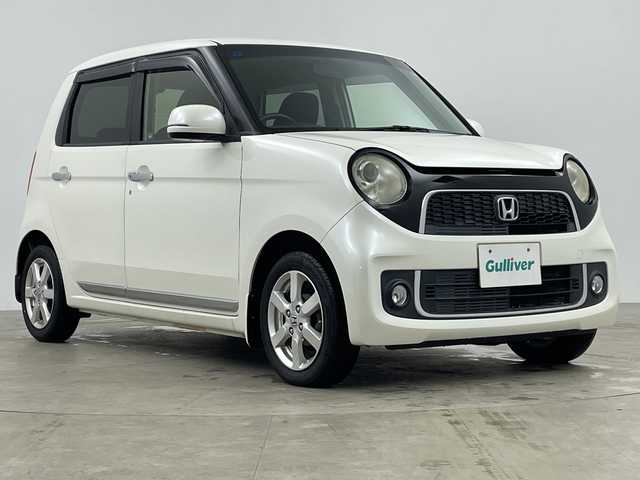 ホンダ Ｎ ＯＮＥ プレミアム Lパッケージ 鹿児島県 2013(平25)年 7.1万km プレミアムホワイトパール 社外ナビ/(Bluetooth/DVD/CD/FM/AM)/キセノンヘッドライト/フォグランプ/オートライト/純正14インチAW/革巻きステアリング/シートリフター/電動格納ミラー/ETC/スマートキ-