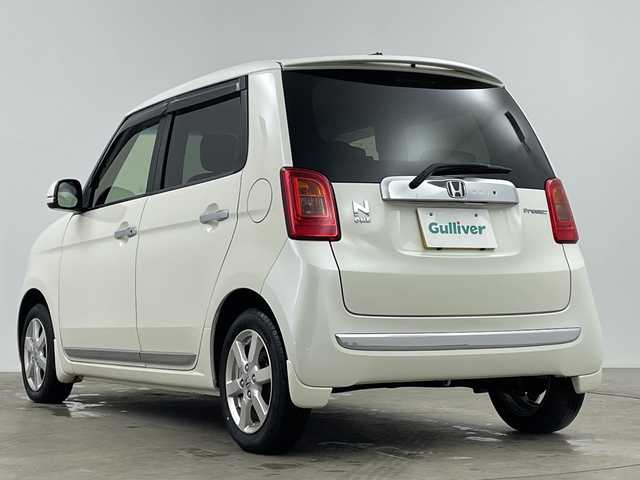 ホンダ Ｎ ＯＮＥ プレミアム Lパッケージ 鹿児島県 2013(平25)年 7.1万km プレミアムホワイトパール 社外ナビ/(Bluetooth/DVD/CD/FM/AM)/キセノンヘッドライト/フォグランプ/オートライト/純正14インチAW/革巻きステアリング/シートリフター/電動格納ミラー/ETC/スマートキ-