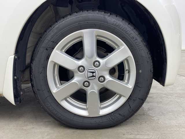 ホンダ Ｎ ＯＮＥ プレミアム Lパッケージ 鹿児島県 2013(平25)年 7.1万km プレミアムホワイトパール 社外ナビ/(Bluetooth/DVD/CD/FM/AM)/キセノンヘッドライト/フォグランプ/オートライト/純正14インチAW/革巻きステアリング/シートリフター/電動格納ミラー/ETC/スマートキ-