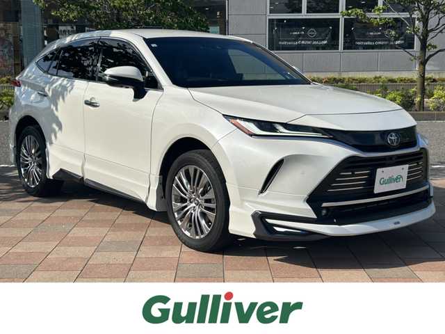 トヨタ ハリアー ハイブリッド Z レザーパッケージ 福島県 2020(令2)年 4.8万km ホワイトパールクリスタルシャイン モデリスタエアロ/JBLプレミアムサウンド/トヨタセーフティセンス/プリクラッシュセーフティ/レーンディパーチャーアラート/オートマティックハイビーム/ロードサインアシスト/レーダークルーズコントロール/ブラインドスポットモニター/ヘッドアップディスプレイ/純正ナビゲーション/【AUX・BT・TV】/アラウンドビューモニター/電動リアゲート/純正エンジンスターター/ビルトインETC2.0/レーダー探知機/型番：AR-W66LA/レザーシート/前席パワーシート/前席シートヒーター/前席ベンチレーション/運転席シートメモリー/デジタルインナーミラー（録画機能付き）/ステアリングリモコン/ステアリングヒーター/LEDオートライト/LEDフォグランプ/純正フロアマット/ドアバイザー