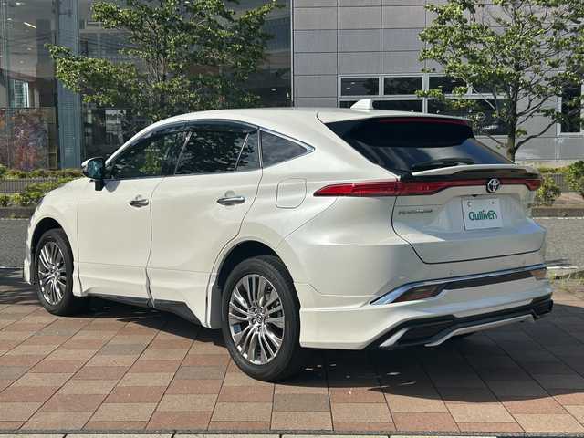 トヨタ ハリアー ハイブリッド Z レザーパッケージ 福島県 2020(令2)年 4.8万km ホワイトパールクリスタルシャイン モデリスタエアロ/JBLプレミアムサウンド/トヨタセーフティセンス/プリクラッシュセーフティ/レーンディパーチャーアラート/オートマティックハイビーム/ロードサインアシスト/レーダークルーズコントロール/ブラインドスポットモニター/ヘッドアップディスプレイ/純正ナビゲーション/【AUX・BT・TV】/アラウンドビューモニター/電動リアゲート/純正エンジンスターター/ビルトインETC2.0/レーダー探知機/型番：AR-W66LA/レザーシート/前席パワーシート/前席シートヒーター/前席ベンチレーション/運転席シートメモリー/デジタルインナーミラー（録画機能付き）/ステアリングリモコン/ステアリングヒーター/LEDオートライト/LEDフォグランプ/純正フロアマット/ドアバイザー