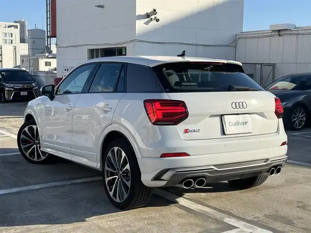 アウディ ＳＱ２ 広島県 2020(令2)年 3.3万km グレイシアホワイトメタリック アダプティブクルーズコントロール/・ホールドアシスト/・パーキングシステム/・リアビューカメラ/・プレセンスフロント/純正ナビ/・TV/・Bluetooth/・バックカメラ/バーチャルコックピット/パワーバックドア/純正ドラレコ2CH/ETC/19インチ5スポークアルミホイール/レッドキャリパー/ハーフレザー